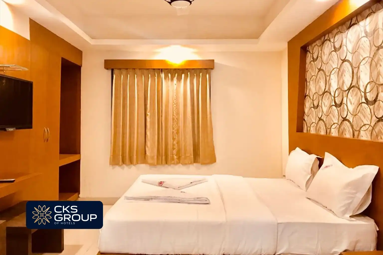 clean and comfortable hotel room with double bed Best Hotel Rooms in South India CKS Group of Companies